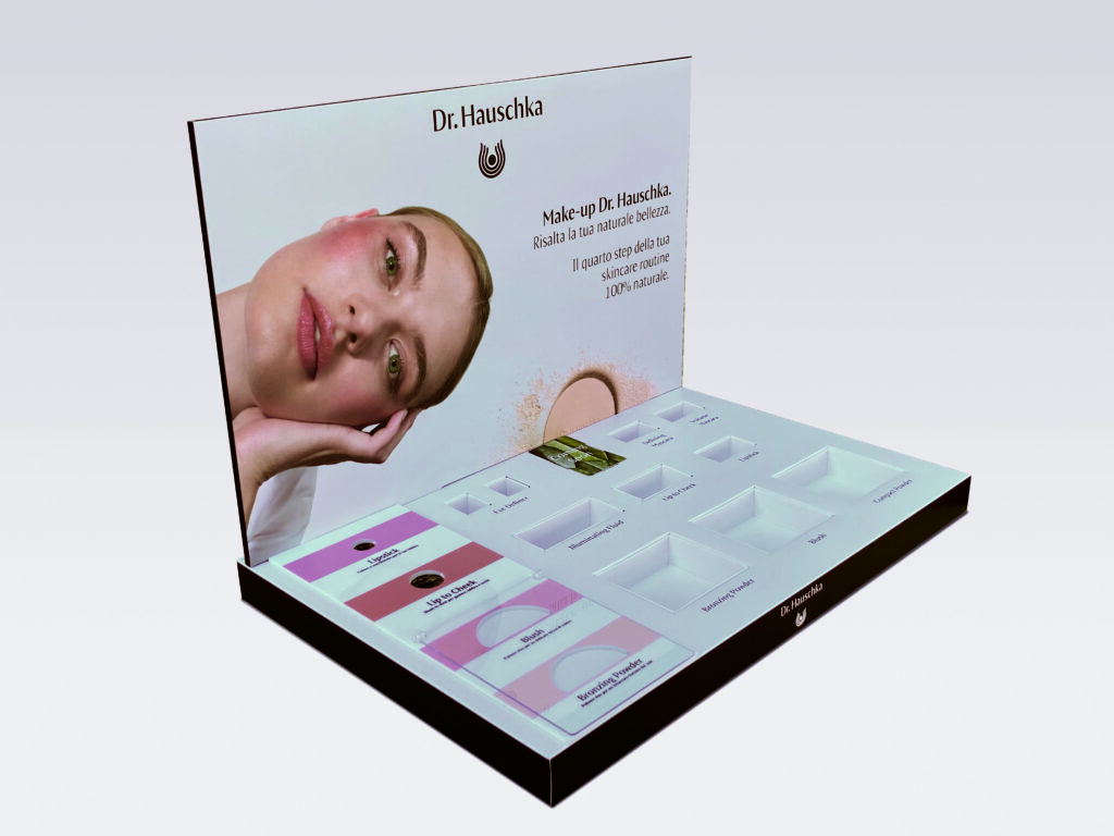 Espositore in cartone riciclabile realizzato da Gpack per Dr. Hauschka, presentato al DIVA Award di Viscom Italia 2025